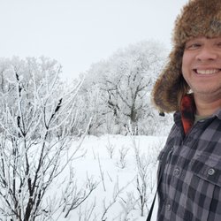 Lake Sakakawea State Park - One of us is better at hiking in the snow than the other - hint: it's him