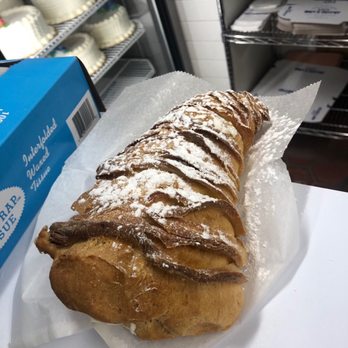 Mike's Pastry - LOBSTER TAIL - must try! Contains all three of their fillings piped into one! - Bakeries Near Me - Boston, Massachusetts Mike's Pastry - LOBSTER TAIL - must try! Contains all three of their fillings piped into one! - Bakeries Near Me - Boston, Massachusetts
