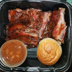 Two Jeff's BBQ - pictured is 1/2 of a full rack of ribs (1 of 2 Styrofoam containers) *each container came w/ bread, beans, and macaroni salad.