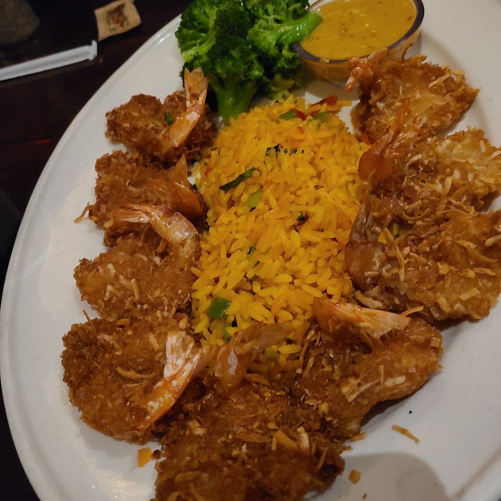 Bahama Breeze - Entree: Coconut Shrimp, yellow rice, broccoli, and citrus mustard sauce. - Caribbean Near Me - Duluth, Georgia