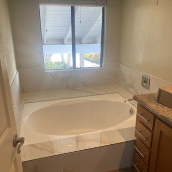R C Home Remodeling - a bathtub in a bathroom - General Contractors Near Me - Chula Vista, California R C Home Remodeling - a bathtub in a bathroom - General Contractors Near Me - Chula Vista, California