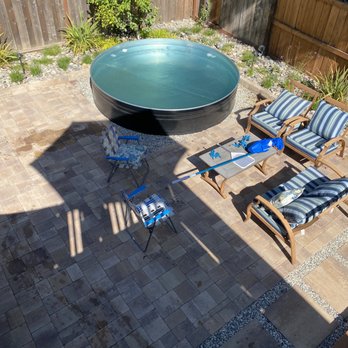 Keystone Yards Landscaping & Design - Shot of the stock tank and sitting space with the old furniture. - Landscaping Near Me - Napa, California