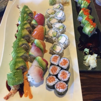 Ho Sushi Bistro - Left to right Evergreen Roll Rainbow Roll California Roll and Salmon al a carte Dragon Roll - Sushi Bars Near Me - Everett, Washington Ho Sushi Bistro - Left to right Evergreen Roll Rainbow Roll California Roll and Salmon al a carte Dragon Roll - Sushi Bars Near Me - Everett, Washington