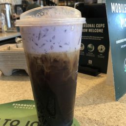 This is an iced coffee with lavender phone, six pumps of vanilla and caramel crunchies on top