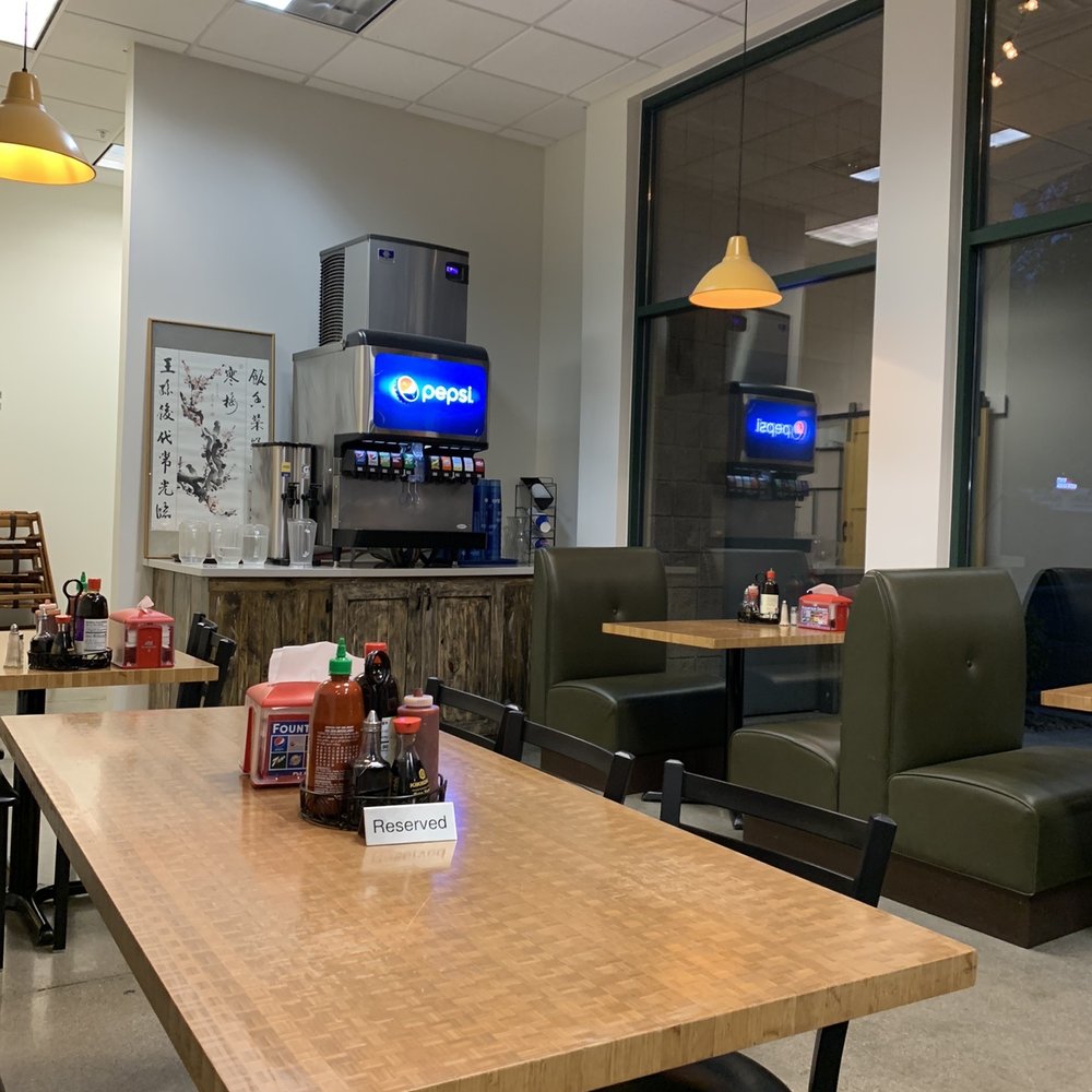 Pho King Orem - a table and chairs in a restaurant - Vietnamese Near Me - Orem, Utah Pho King Orem - a table and chairs in a restaurant - Vietnamese Near Me - Orem, Utah