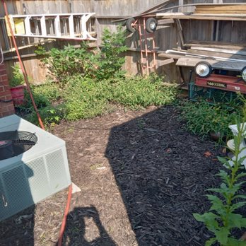 Michigan Lawn and Snow - a yard with a heater and a garden - Lawn Services Near Me Michigan Lawn and Snow - a yard with a heater and a garden - Lawn Services Near Me