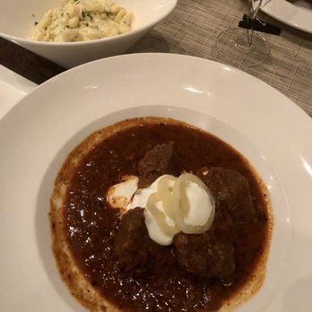 Naschmarkt - Campbell - Hungarian beef goulash w/ spatzle in the back - Austrian Near Me - Campbell, California Naschmarkt - Campbell - Hungarian beef goulash w/ spatzle in the back - Austrian Near Me - Campbell, California
