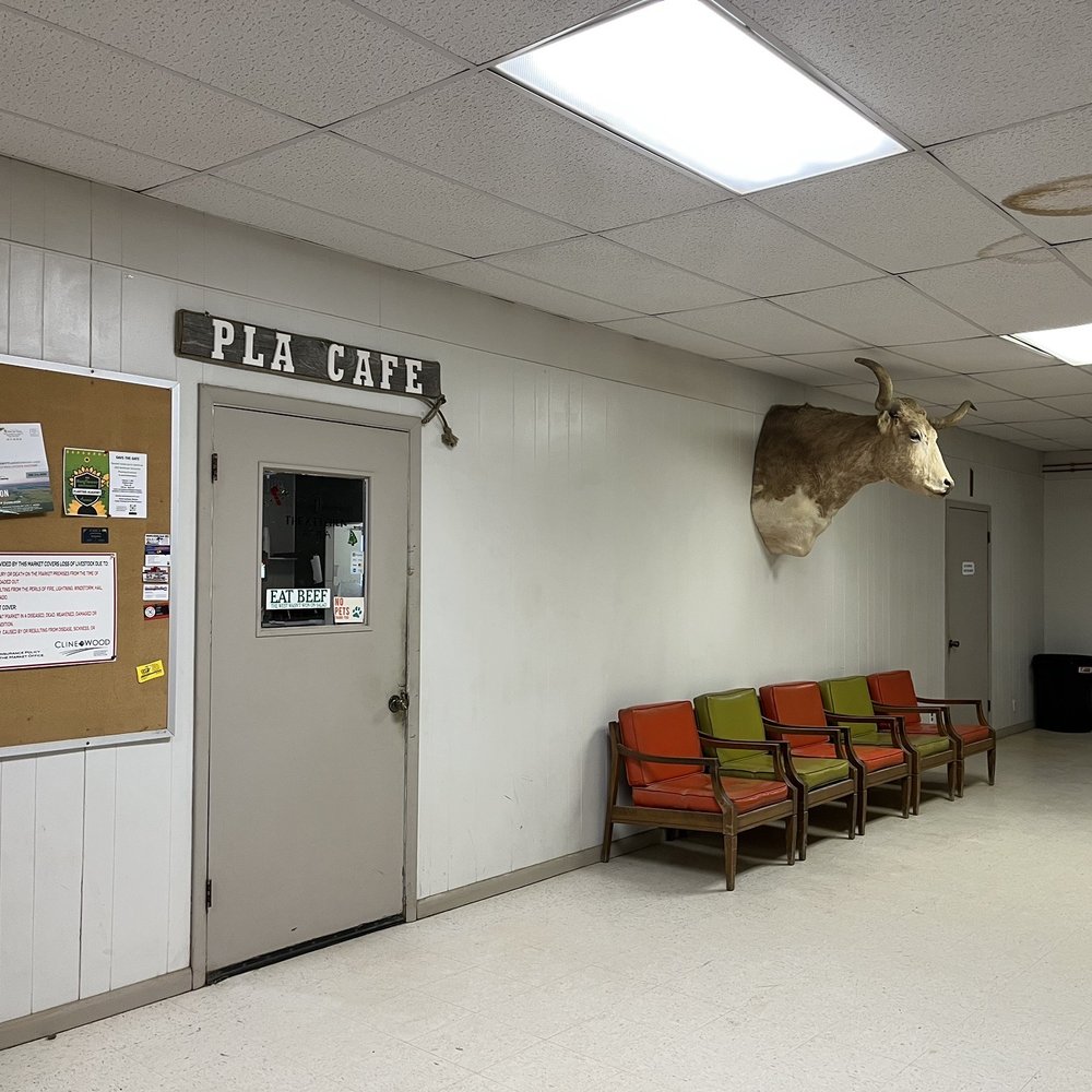 Pla Cafe - Interior door inside the Philip Livestock Auction. - American Near Me - Philip, South Dakota