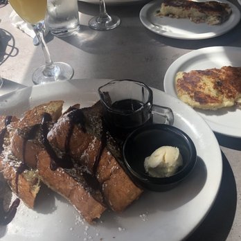 Ruperts at the Edge - Chefs special French toast- blueberry drizzle , lemon stuffing! Delicious!!! - Breakfast & Brunch Near Me - Edgewater, Colorado