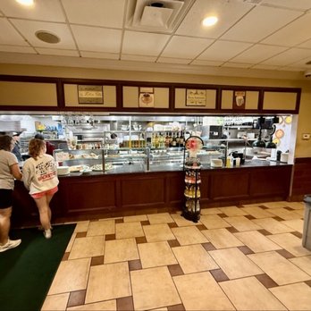 Chef Paolino Cafe - The counter. And there's Chef Paolino, smiling as usual :-). The takeout and bottle store are off to the left in the entryway. - Italian Near Me - Catonsville, Maryland Chef Paolino Cafe - The counter. And there's Chef Paolino, smiling as usual :-). The takeout and bottle store are off to the left in the entryway. - Italian Near Me - Catonsville, Maryland