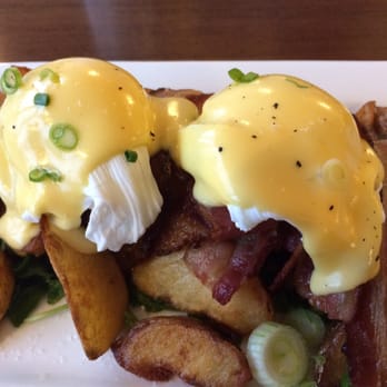 Yolks - Bacon and arugula eggs benedict on truffle lemon hash browns. - Coffee & Tea Near Me - Vancouver, British Columbia Yolks - Bacon and arugula eggs benedict on truffle lemon hash browns. - Coffee & Tea Near Me - Vancouver, British Columbia