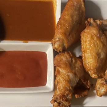 Madam’s Lounge & Theatre - Chicken Wings with side of Red Chile and BBQ Sauces -wings good, sauces bad - New American Near Me - Red River, New Mexico Madam’s Lounge & Theatre - Chicken Wings with side of Red Chile and BBQ Sauces -wings good, sauces bad - New American Near Me - Red River, New Mexico