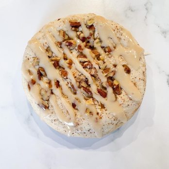 The Cookie Crew - a frosted cake with nuts on top - Desserts Near Me The Cookie Crew - a frosted cake with nuts on top - Desserts Near Me