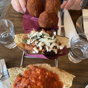 Trapizzino - Parmigiana di Melanzane (Eggplant)Polpetta al Sugo (Meatball)Suppli Classico - Italian Near Me - New York, New York Trapizzino - Parmigiana di Melanzane (Eggplant)Polpetta al Sugo (Meatball)Suppli Classico - Italian Near Me - New York, New York