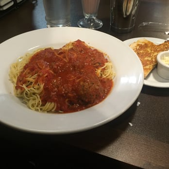 Denny's - Crossroads - Full plate of spaghetti with three giant meatloaf meatballs and a slice of toasted garlic bread - American Near Me - Calgary, Alberta Denny's - Crossroads - Full plate of spaghetti with three giant meatloaf meatballs and a slice of toasted garlic bread - American Near Me - Calgary, Alberta