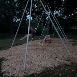 A nice, retro swing set. A little squeaky and low to the ground, but still fun.