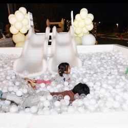 Kids Car Club LA - These two kids had a blast in the ball pit, laughing and playing nonstop. It was clean, colorful, and even had slides to make it extra fun!