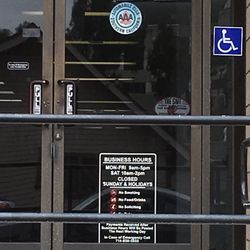 AAA - Automobile Club of Southern California - Hours posted on door