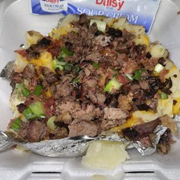 a meal in a styrofoam container