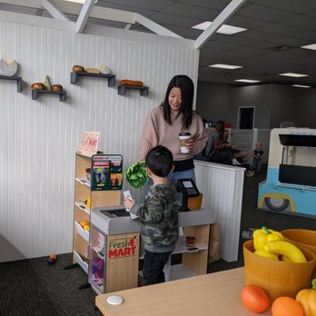 Play/Cafe - a woman and a child in a play area - Coffee & Tea Near Me - Yakima, Washington Play/Cafe - a woman and a child in a play area - Coffee & Tea Near Me - Yakima, Washington