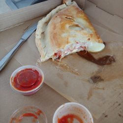 Mad River Pizza - That is less thank HALF the calzone! It is huge!