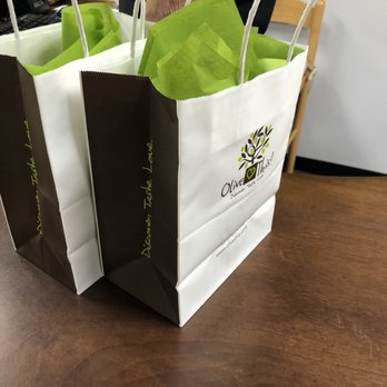 Olive This! - two bags of food on a table - Specialty Food Near Me - Charlotte, North Carolina
