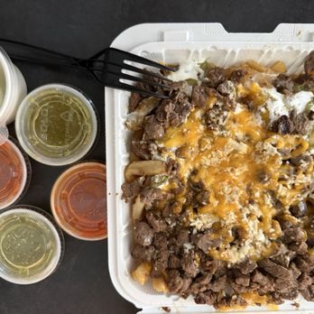 Chuy's Taco Shop - Carne asada fries and salsa from the salsa bar!!! - Mexican Near Me - San Diego, California Chuy's Taco Shop - Carne asada fries and salsa from the salsa bar!!! - Mexican Near Me - San Diego, California
