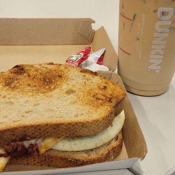 Dunkin - Ok this was good Sourdough sando w iced coffee - Donuts Near Me - Fort Lauderdale, Florida