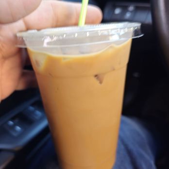 Boomtown Babes Espresso - a hand holding a cup of iced coffee - Coffee & Tea Near Me - Williston, North Dakota Boomtown Babes Espresso - a hand holding a cup of iced coffee - Coffee & Tea Near Me - Williston, North Dakota