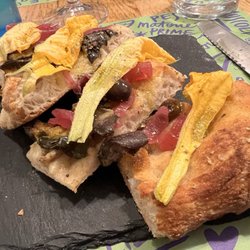 Il Timone - Their replacement for fish for us was the zucchini blooms, pickled onion, local olives, and eggplant on amazing focaccia.