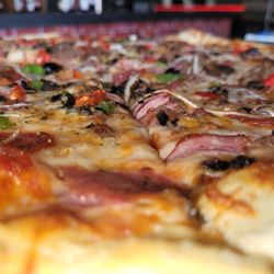 North End Pizza Pub - Up close our Works pizza looks too good to eat