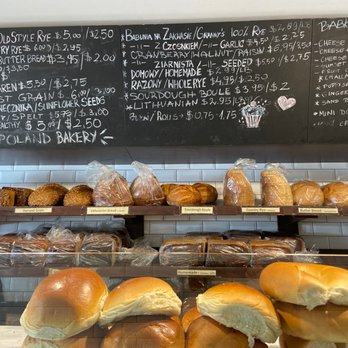 Old Poland Bakery - Menu board and the gorgeous bread on display - Bakeries Near Me - Brooklyn, New York