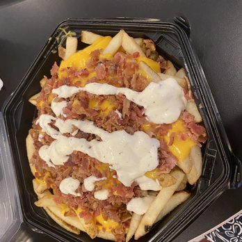 Scoops and Slices - Bacon cheese fries - Ice Cream & Frozen Yogurt Near Me - Captiva, Florida Scoops and Slices - Bacon cheese fries - Ice Cream & Frozen Yogurt Near Me - Captiva, Florida