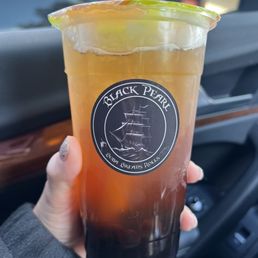 Iced peach tea with boba Iced peach tea with boba