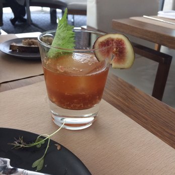 Perry St - Fig & Pimm's cocktail- shiso leaf was a nice touch! - New American Near Me - New York, New York Perry St - Fig & Pimm's cocktail- shiso leaf was a nice touch! - New American Near Me - New York, New York