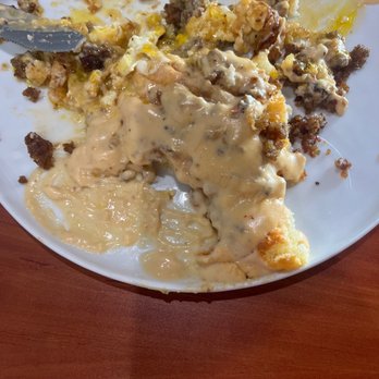 Maverick Biscuit - Biscuit and gray with an egg on top - Breakfast & Brunch Near Me - Mauldin, South Carolina Maverick Biscuit - Biscuit and gray with an egg on top - Breakfast & Brunch Near Me - Mauldin, South Carolina