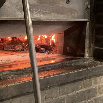 Juliana's - The fire pit. - Pizza Near Me - Brooklyn, New York Juliana's - The fire pit. - Pizza Near Me - Brooklyn, New York