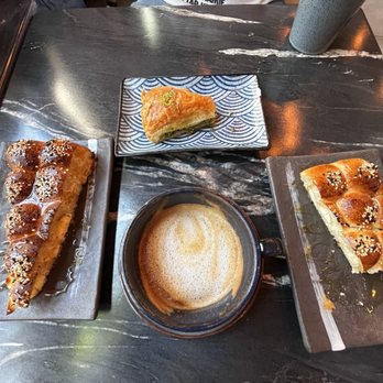 Delah Coffee - Pistachio baklava honeycomb bread, latte and sana'ani coffee. - Desserts Near Me - Oakland, California Delah Coffee - Pistachio baklava honeycomb bread, latte and sana'ani coffee. - Desserts Near Me - Oakland, California