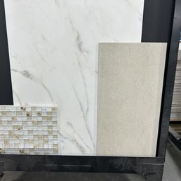 Perfect bath and  tile with mosaic for niche.