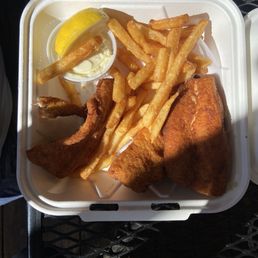 Whitefish meal with fries and slaw.