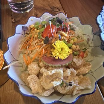 BODHI - Papaya Salad with Pork Rinds and Edible Flowers - Thai Near Me - Indianapolis, Indiana BODHI - Papaya Salad with Pork Rinds and Edible Flowers - Thai Near Me - Indianapolis, Indiana