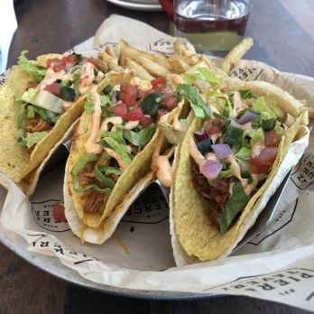 Pierce Tavern - Spicy Chicken Double Decker Tacos - Burgers Near Me - Downers Grove, Illinois Pierce Tavern - Spicy Chicken Double Decker Tacos - Burgers Near Me - Downers Grove, Illinois