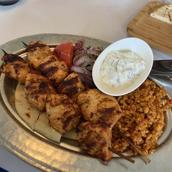 L'Olive - Chicken kabob with couscous and yogurt. Tender! - Mediterranean Near Me - Venice, Florida