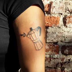 Miller's Tattoo & Barber Shop