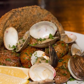 The Kitchen at Atomic - Cornmeal Fried Sea Bream : Creamer Potatoes, Clams, Smoked Sea Salt, Garlic Oil & Sambal Remoulade. Interesting take on fish & chips..great! - New American Near Me - Las Vegas, Nevada