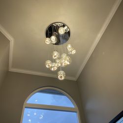 ERM Electric - High ceiling chandelier installation