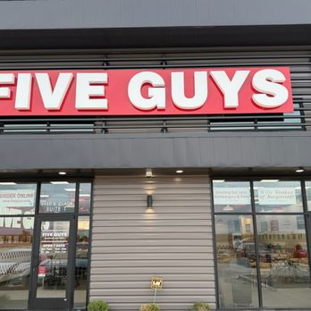 Five Guys - The exterior of the Five Guys restaurant on South Clack Street in Abilene, Texas, with the red and white Five Guys sign above... - Hot Dogs Near Me - Abilene, Texas Five Guys - The exterior of the Five Guys restaurant on South Clack Street in Abilene, Texas, with the red and white Five Guys sign above... - Hot Dogs Near Me - Abilene, Texas