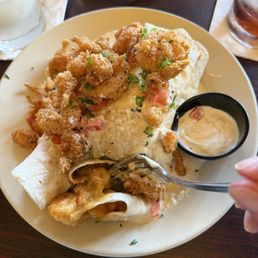 Seafood enchiladas and coconut lavender margarita to the top left. Seafood enchiladas and coconut lavender margarita to the top left.
