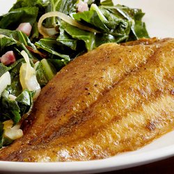 Blue Bayou Cajun House - Fillet of Catfish with a side our the best collard greens in the West