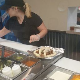 a woman serving food